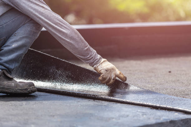Professional Exterior Waterproofing technician working in Bellevue, MI